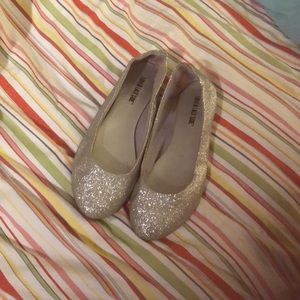 9.5 silver shoes. Good condition. One makeup stain